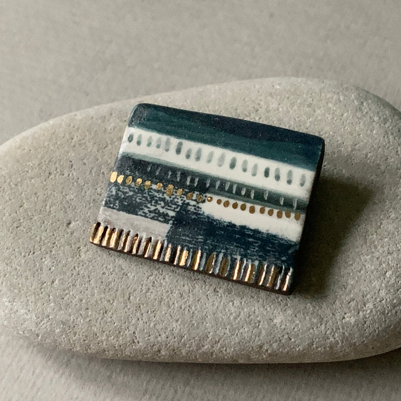 BROOCHES